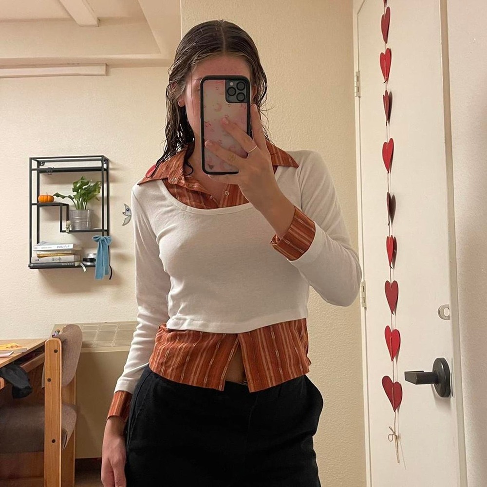 the white and orange fitted long sleeve with built in colared shirt